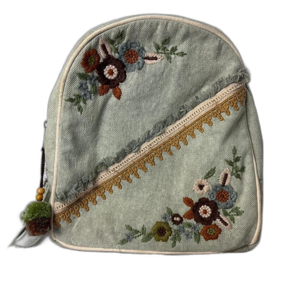 Earthbound Trading Co. Small Canvas Embroidered Backpack with Pom poms
